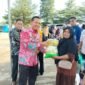 PENETRASI PASAR Pemkab Mesuji menyiapkan sebanyak 1800 paket sembako tebus murah yang di khususkan bagi masyarakat Desa Brabasan [Nr]