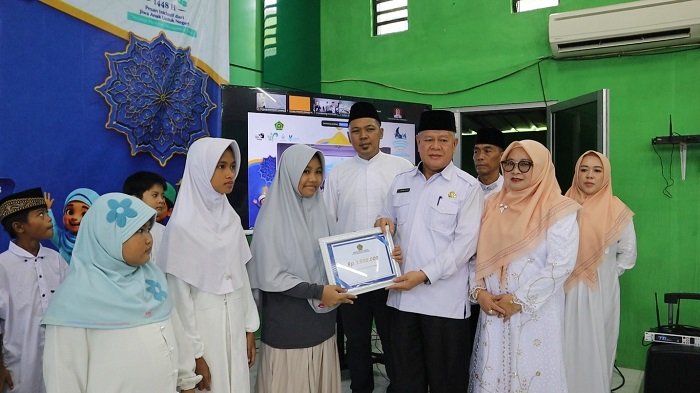 MUHARAM-Kepala Kantor Kementerian Agama Kota Bandar Lampung, Erwinto, mengatakan Peaceful Muharam merupakan ikhtiar bersama untuk memastikan anak yatim dan penyandang disabilitas merasakan kehadiran negara sekaligus menguatkan semangat gotong royong dan kepedulian sosial [DE]