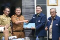 Sekda Metro Ahmad Hariyanto dan Kadiskominfo Saat Menerima Kunjungan JMSI Lampung