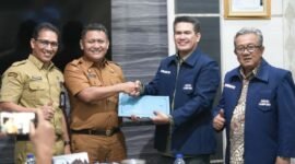 Sekda Metro Ahmad Hariyanto dan Kadiskominfo Saat Menerima Kunjungan JMSI Lampung