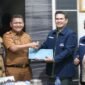 Sekda Metro Ahmad Hariyanto dan Kadiskominfo Saat Menerima Kunjungan JMSI Lampung