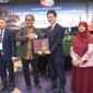 Foto menunjukkan simposium bertajuk 