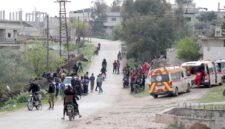 Sejumlah ambulans terlihat di jalur masuk Kota Koayiah di Daraa, Suriah selatan, pada 25 Maret 2025. Enam warga sipil tewas dan beberapa lainnya luka-luka setelah pasukan Israel menggempur Kota Koayiah di Daraa pada Selasa (25/3), demikian menurut otoritas urusan luar negeri Suriah. (Xinhua)