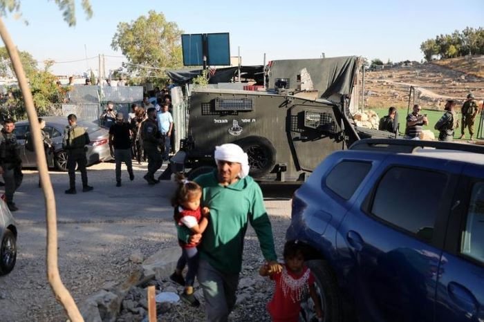 PASUKAN Israel menyerbu Desa Umm al-Kheir di daerah Masafer Yatta, sebelah selatan Hebron, Tepi Barat, dalam sebuah acara yang diadakan untuk memprotes kekerasan pemukim Israel pada 28 Juli 2026. (Xinhua)